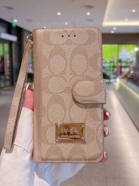 Beige Coach Apple iPhone 13 Phone Case w/Gold Coach Logo Detail & Wristlet Strap